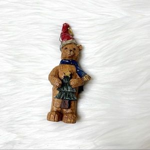 Wood carved Christmas bear holding tree figure